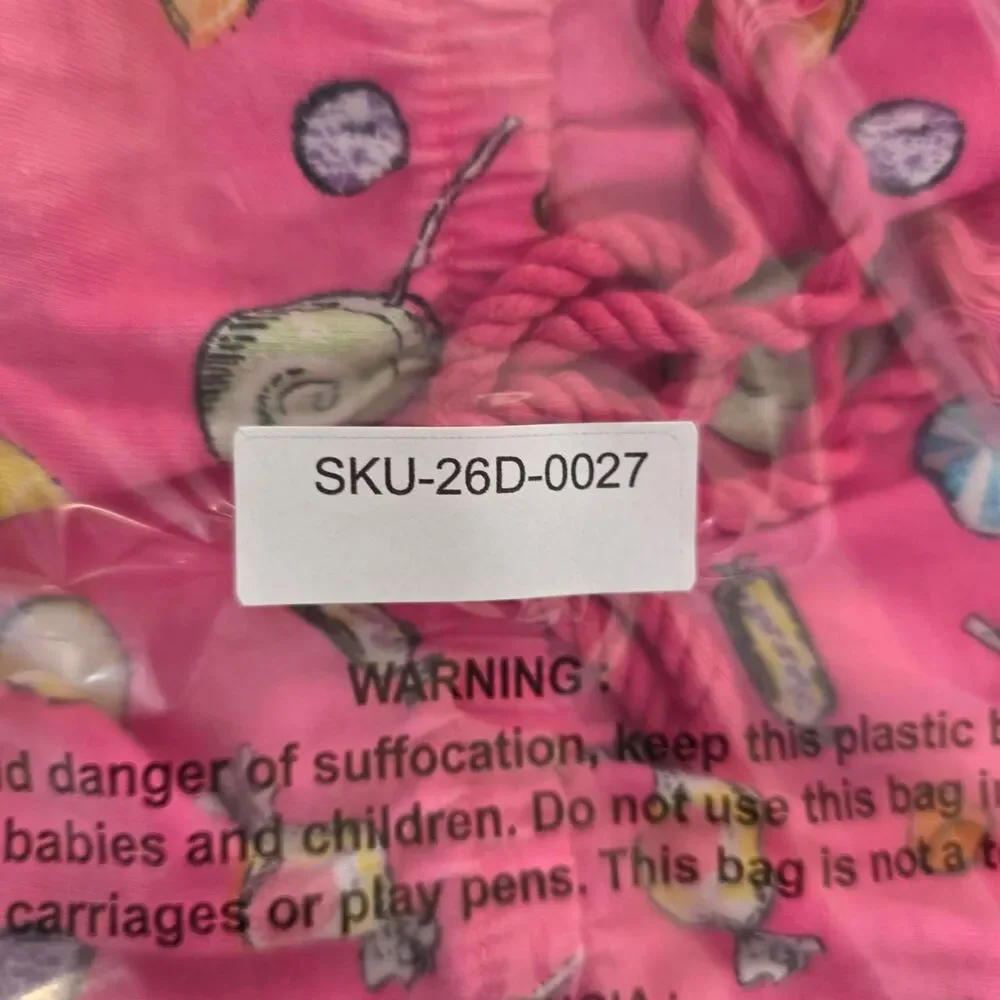 Extremely Me, Child's Pink Draw String Dress with Candy Design in size 7/8
